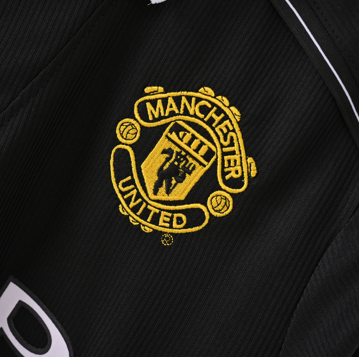 Manchester United 1995/96 Away Jersey — SHARP x Umbro in Black with Red Power Stripes