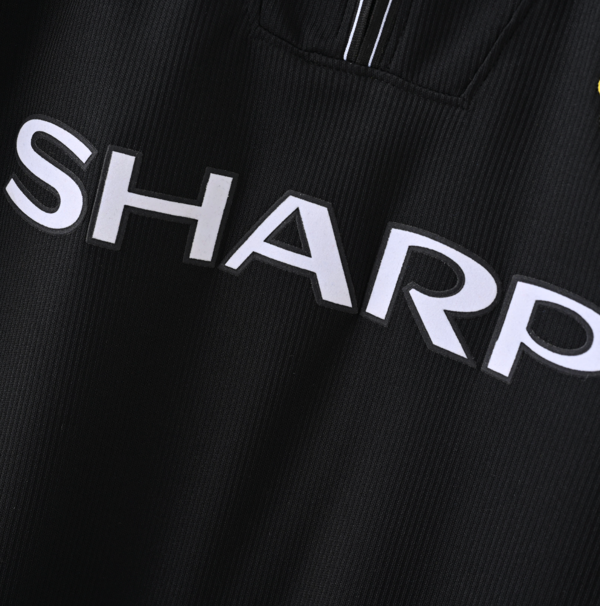 Manchester United 1996/97 Away Jersey — Umbro x SHARP in Black & Red Brilliance
