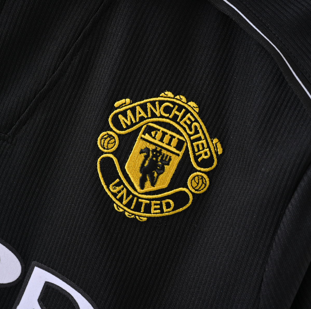 Manchester United 1996/97 Away Jersey — Umbro x SHARP in Black & Red Brilliance