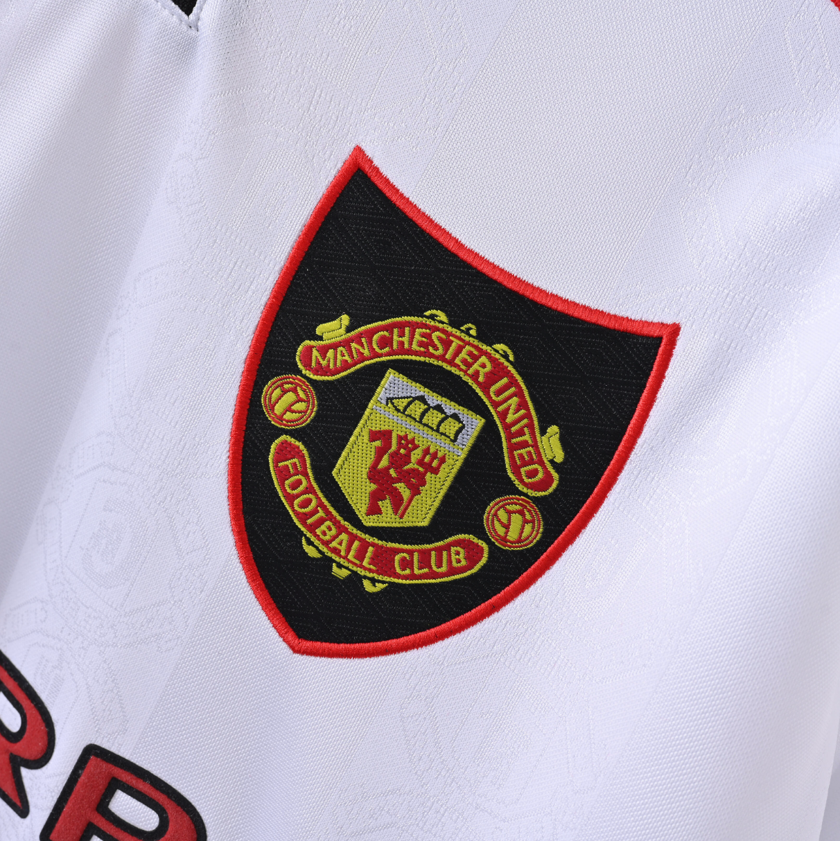 Manchester United 1997/98 Away Jersey — SHARP VIEWCAM x Umbro in White & Red Precision