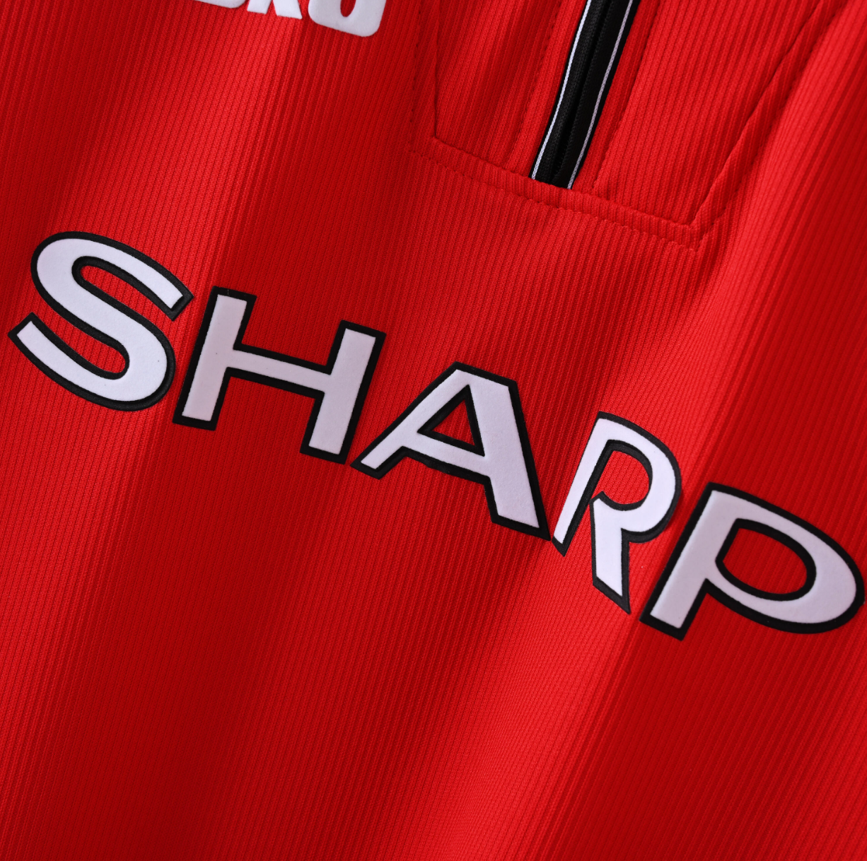 xManchester United 1994/95 Home Jersey — SHARP x Umbro in Red with Diamond Sleeve Detail
