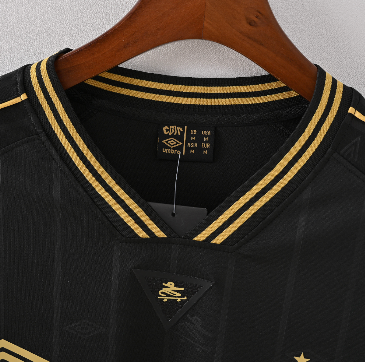 Santos FC x Charlie Brown Jr — Umbro Tribute Jersey in Black & Gold Rebellion