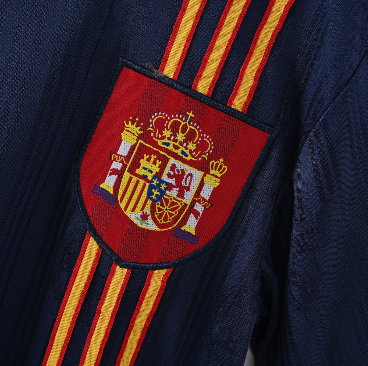 Spain 2006 Home Jersey — Red Command with Tricolor Stripes & World Cup Ambition